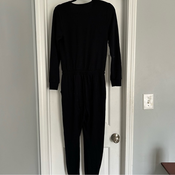 Beyond Yoga Cozy Fleece Jogger Black Jumpsuit with Criss Cross Opening L… - Picture 8 of 8